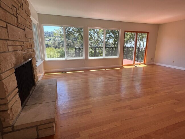 Living Room with Wood Burning Fireplace - 20 Drake Ln