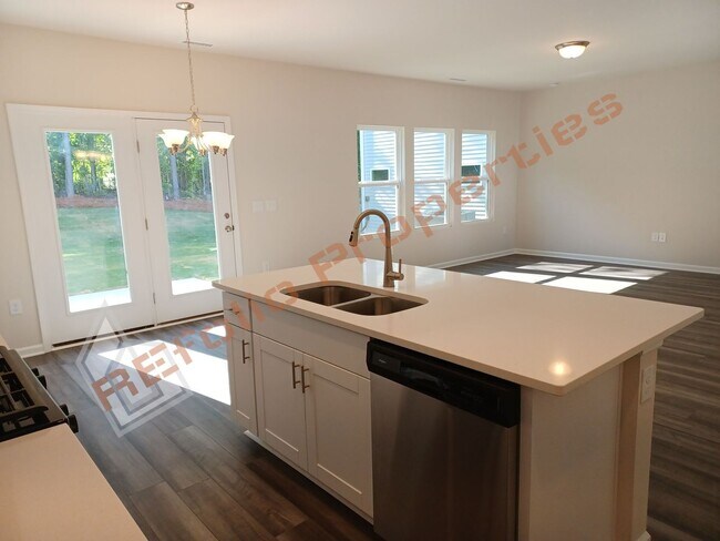 Building Photo - Modern 3 Bedroom 2-Car Garage House with L...