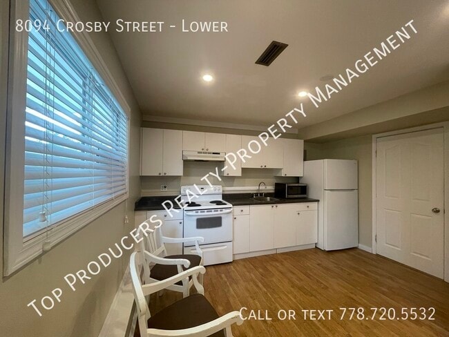 Building Photo - Bright 1 Bedroom Ground Level Suite