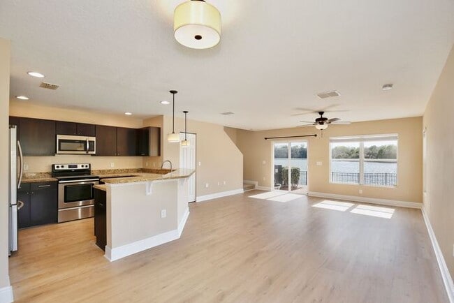 Photo - Spacious 3/2.5 End-Unit with Breathtaking Lake Views in Sanford! House
