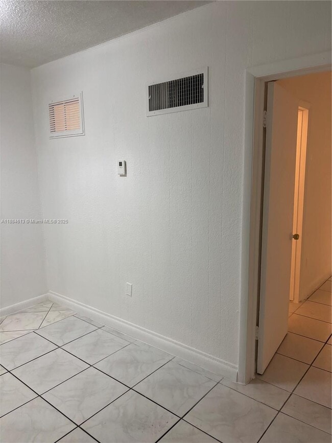 Building Photo - 1255 W 49th Pl