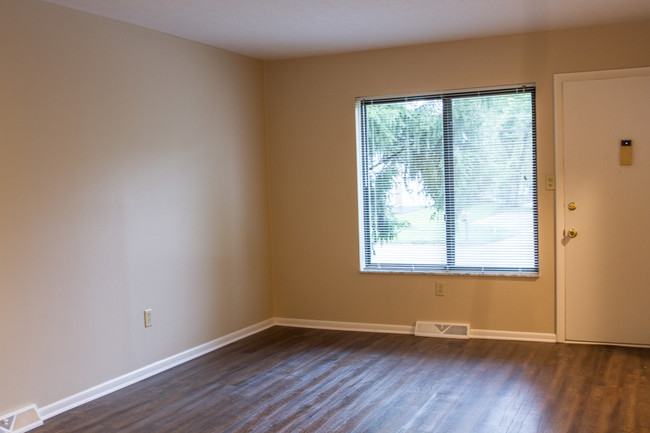 Remodeled / Luxury flooring in living room - Stow Reserve Apartments