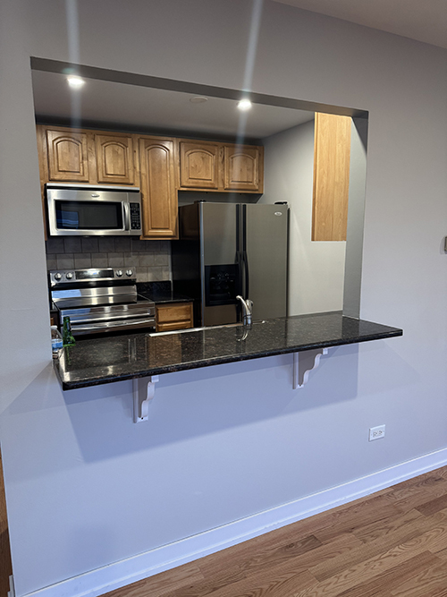 kitchen area - 715 Whitesail Dr