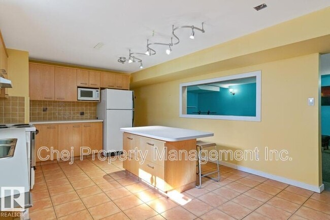 Building Photo - 8007-8128 128 Ave NW