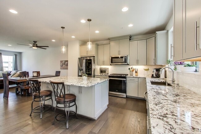 Building Photo - Stunning Contemporary Townhome - 4 Bedroom...