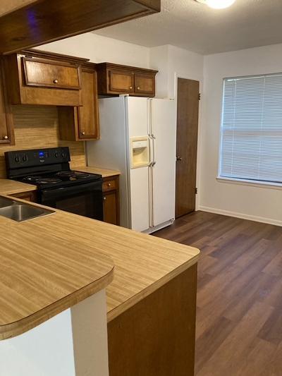 Kitchen w lg fridge, pantry. - 1607 Hazelwood St