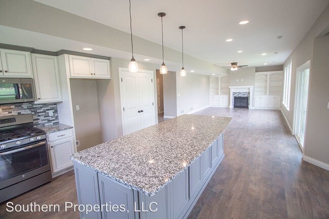 Foto del edificio - 4 br, 2.5 bath House - 5651 Ralph Dobbs Way