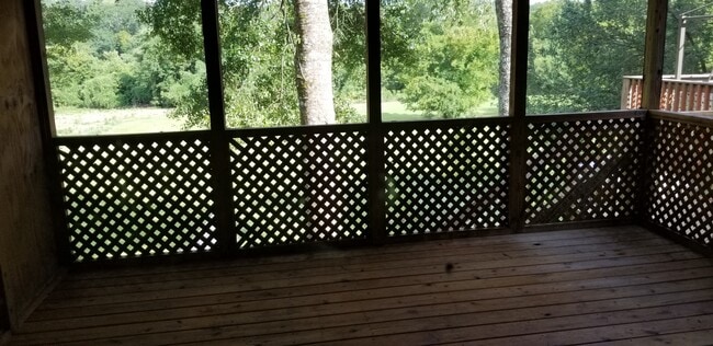 screened deck overlooks fen yd - 804 Old Rocky Ridge Ln