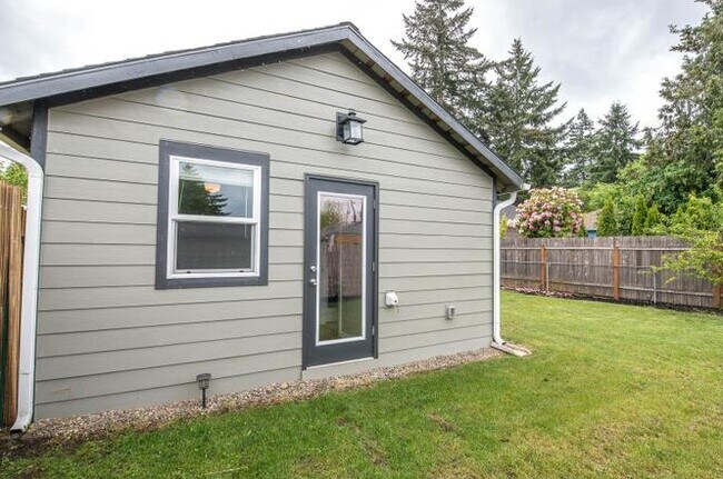 backyard off of the ADU. Has been fenced. - 6117 SE Steele St