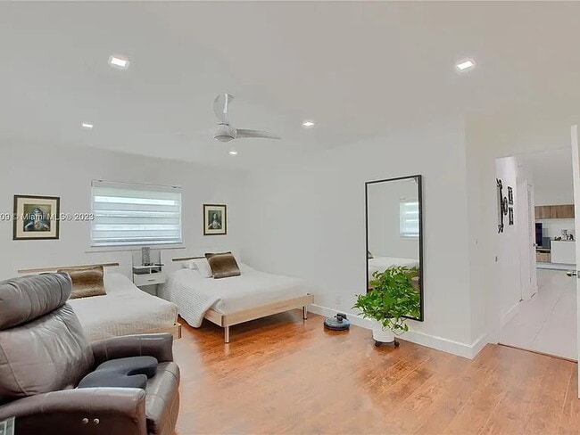 Building Photo - MUST READ: This rental is available for a roommate occupancy. The master bedroom is vacant, while...
