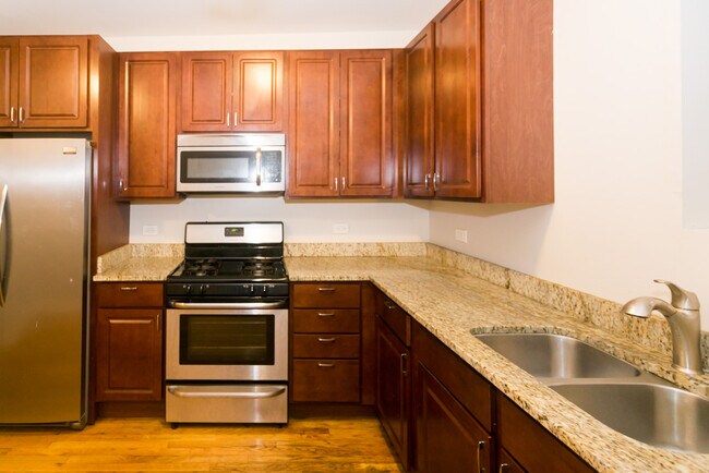 Building Photo - 7434 N Artesian Ave