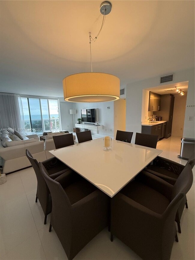 Building Photo - 10275 Collins Ave