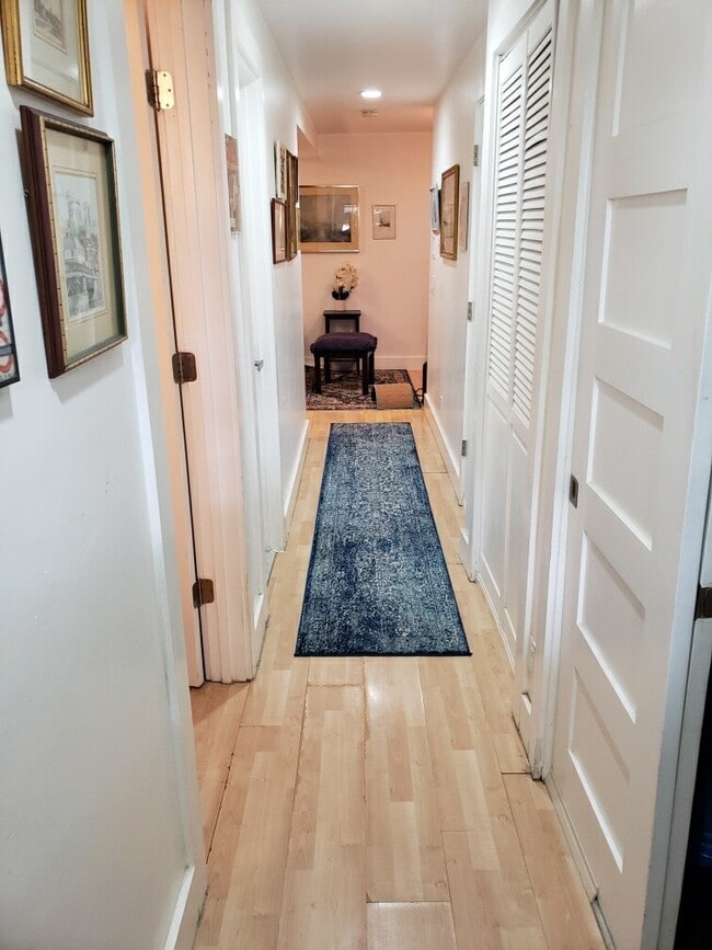 view of hall from entrance laundry room on right, then utility. - 1626 Massachusetts Ave SE