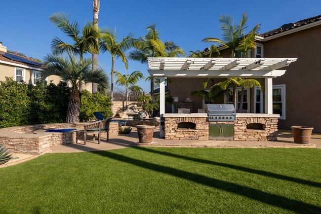 Building Photo - Coastal Retreat in La Costa - Spacious Home with Backyard Oasis