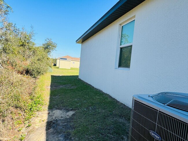 Building Photo - Charming 4 Bedroom, 2 Bathroom Home in Poi...