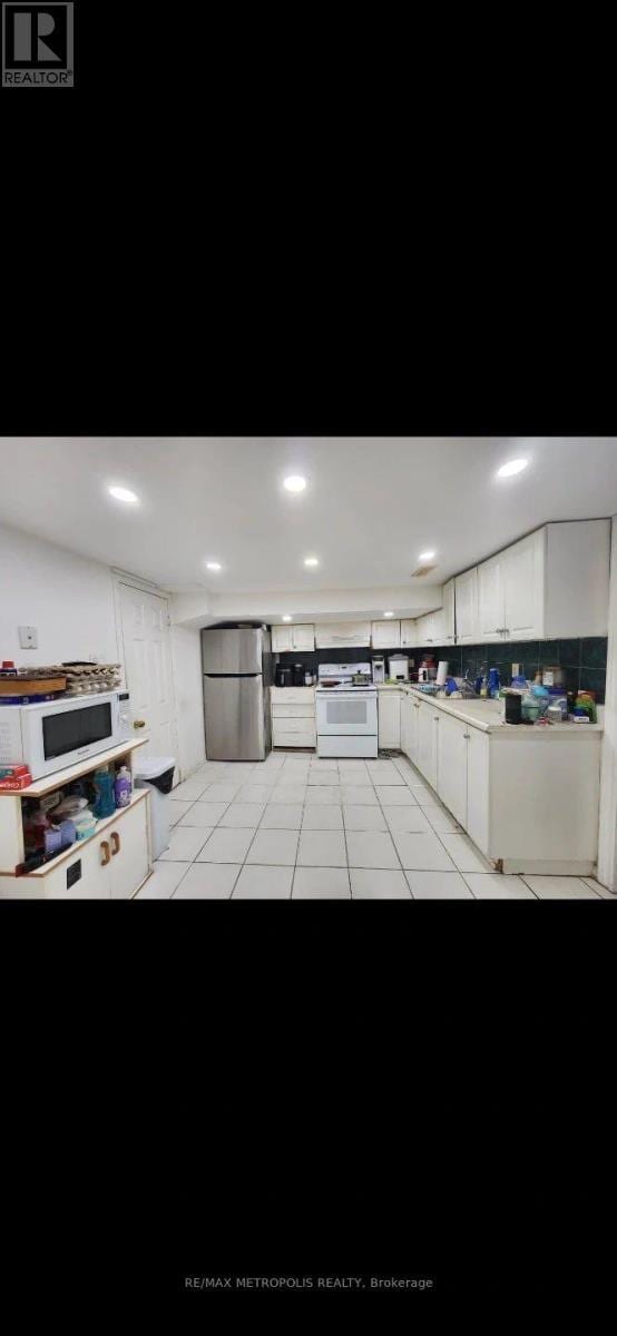 Building Photo - 3244 Lawrence Ave E