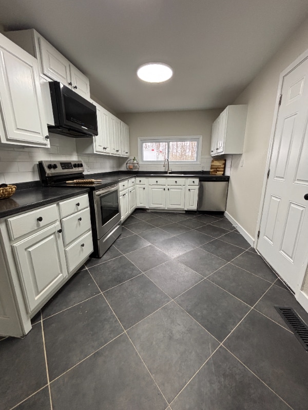 Building Photo - 1105-1107 Reynolds Rd