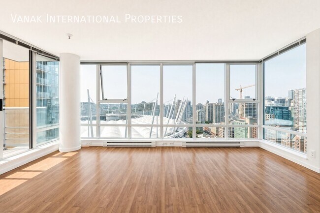 Photo du bâtiment - 2 Bed + Den + Solarium | 2 Bath | Parking | Spectrum