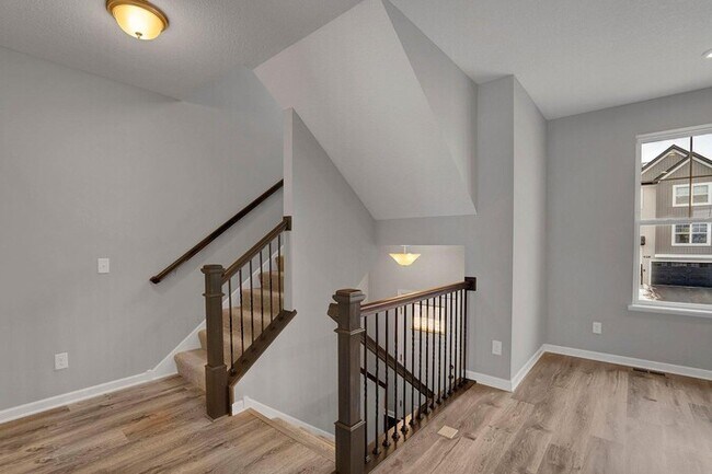 Building Photo - Available now is an almost new, charming 3...