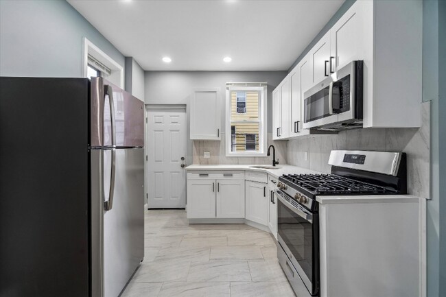 Foto del edificio - 5524 Upland St