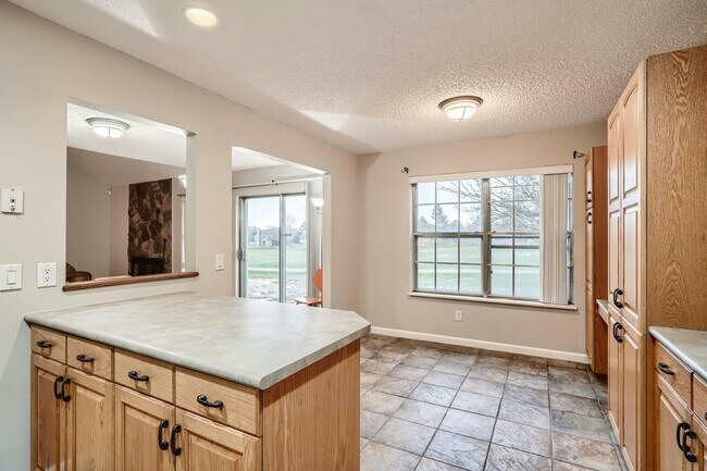 Building Photo - 2528 South Vaughn Way, Unit D