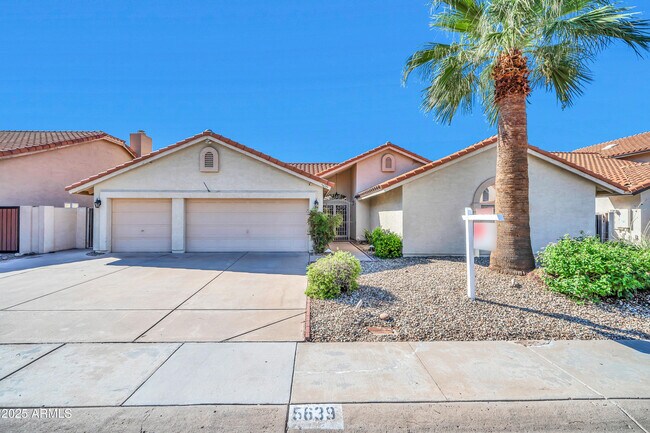Building Photo - 5639 E Aire Libre Ave