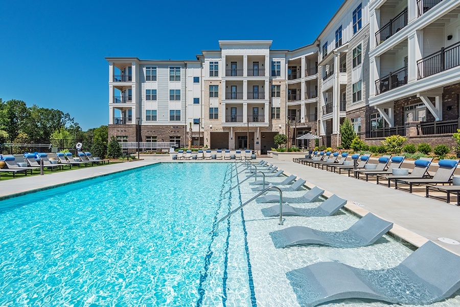 Relax on the sun shelf of our resort-style saltwater pool - Briley