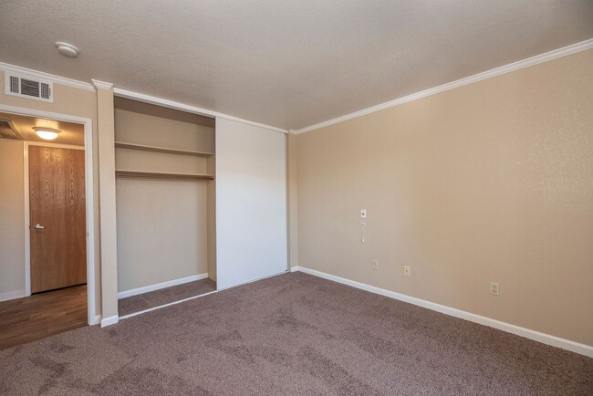 Bedroom with spacious closet - Lodi Commons Senior Living