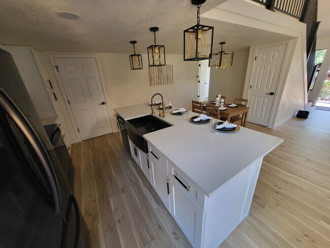 Kitchen and dining area - 9170 W 88th Cir