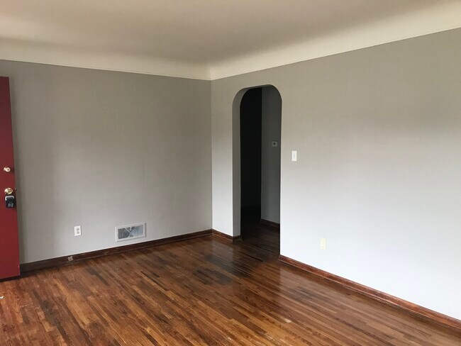 Living room with hardwood floors - 6642 Emmet St