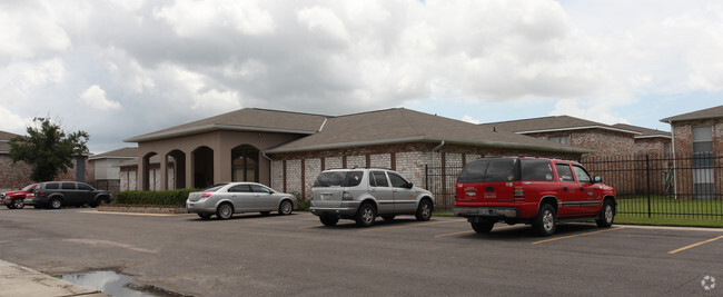 Building Photo - Acadian Village Apartment