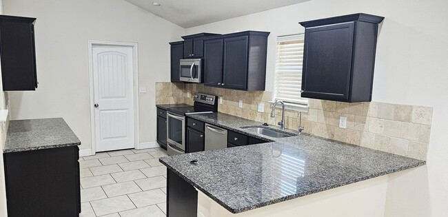 Foto del edificio - 9406 Caprock Ct
