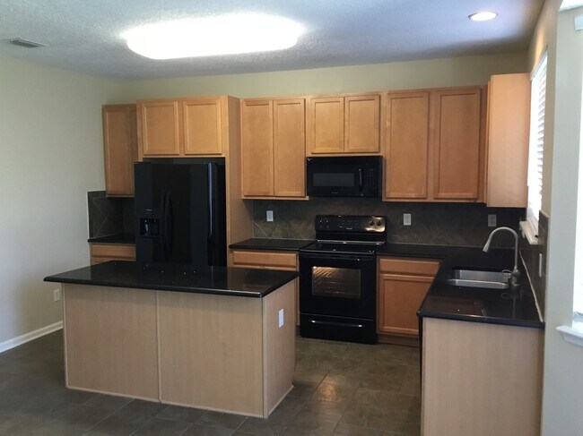 Building Photo - 75368 Ravenwood Dr
