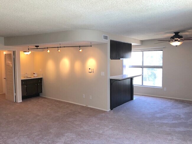 Living room, dining area, with breakfast bar and wet bar - 11168 Acama St