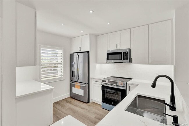 Building Photo - 1950 SW Palm City Rd