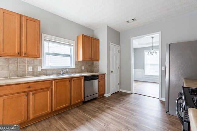 Foto del edificio - 3290 Cooper Woods Dr