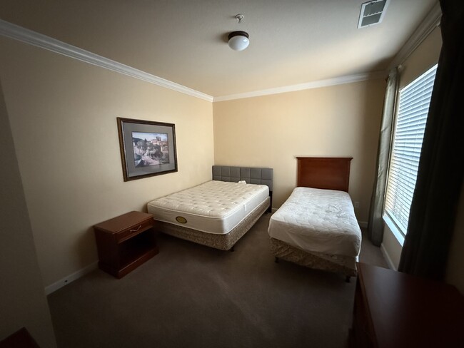 Building Photo - Spacious Furnished 3-Bedroom Condo Oasis w...