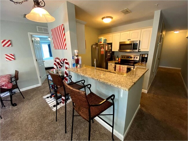 Modern kitchen, granite counters, stainless steel appliances, dishwasher, everything! - 835 SW 9th St
