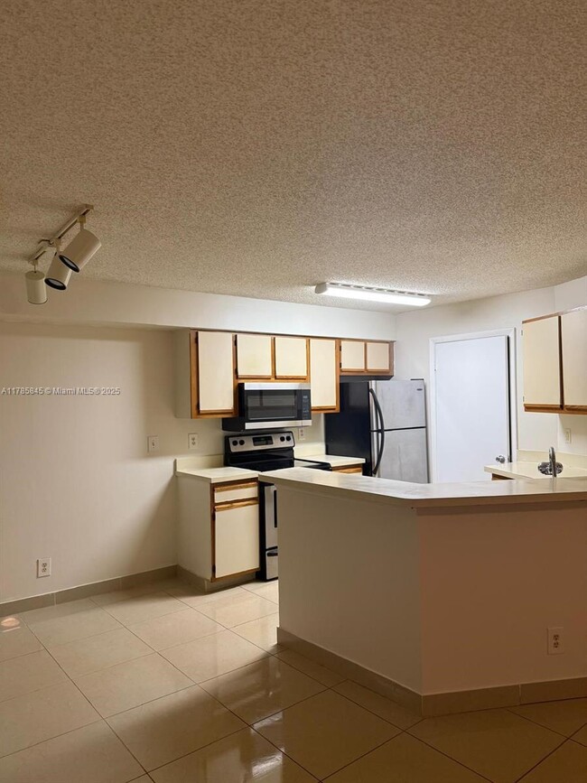 Foto del edificio - 9999 Summerbreeze Dr