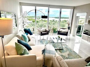 Building Photo - 10275 Collins Ave