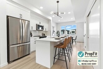 Building Photo - 7340 Klapstein Cres SW