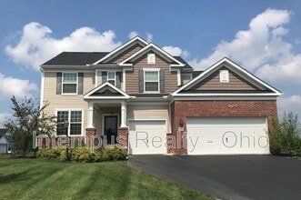 Building Photo - 9390 Woodbine Way
