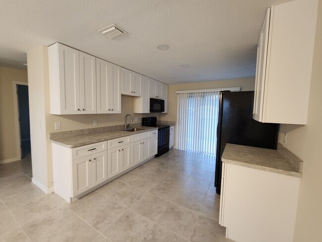 Building Photo - Cozy Duplex in the Beautiful Buckingham Area
