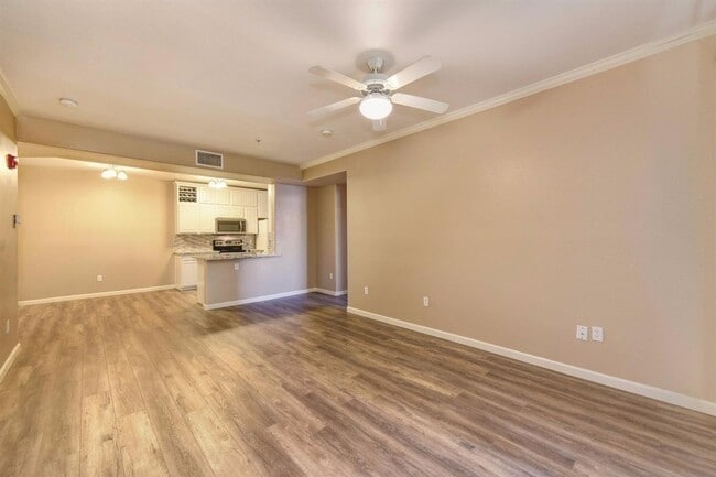 Building Photo - NICE 3 BEDROOM CONDO, 2 BATH, & 2 CAR GARA...