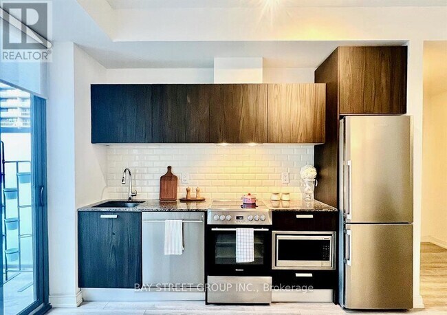 Photo du bâtiment - 50 Charles St E