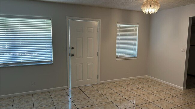 Building Photo - 1200 SW 52nd Ave