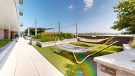 Located on the 6th floor of a modern residential building at 2827 Telek Pl in Alexandria, Virginia, this expansive rooftop amenity terrace is thoughtfully designed for outdoor relaxation and social gathering. The terrace is finished with large-format stone pavers and stretches along the building's facade, bordered by manicured planter beds filled with native grasses and ornamental plants that add a natural, garden-like quality to the elevated setting.

A striking louvered pergola serves as the centerpiece of the space, providing adjustable shade over a generous seating area furnished with cushioned lounge chairs and intimate café-style tables and chairs. Overhead string lights lend a warm ambiance suited for both daytime lounging and evening gatherings. A built-in bench with colorful cushions runs alongside a low stone wall, creating a comfortable, sheltered nook for conversation.

Adjacent turf areas are outfitted with freestanding hammocks and clusters of blue-striped armchairs beneath a secondary pergola structure, offering versatile spots for relaxation. Built-in grills are conveniently integrated into the terrace layout, making the space ideal for outdoor dining. Throughout the terrace, panoramic views of the Alexandria skyline and surrounding greenery are visible, enhancing the open, airy atmosphere of this well-appointed outdoor retreat.