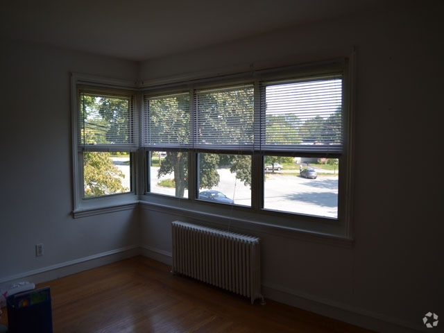 Sala de estar - The Residences at Garden City