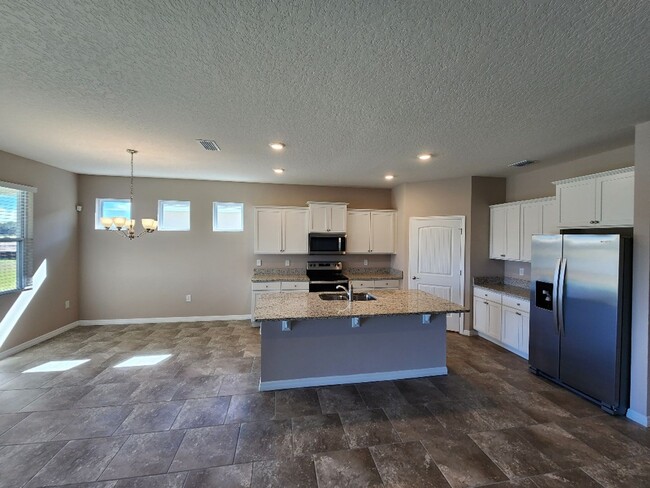 Building Photo - Lovely 4 Bedroom Home at Oak Leaf Preserve