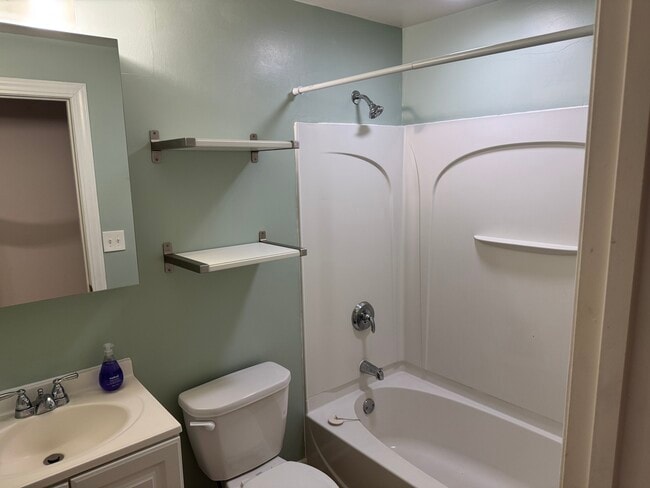 Updated bathroom with built in shelves - 1369 Saint Clair Ave